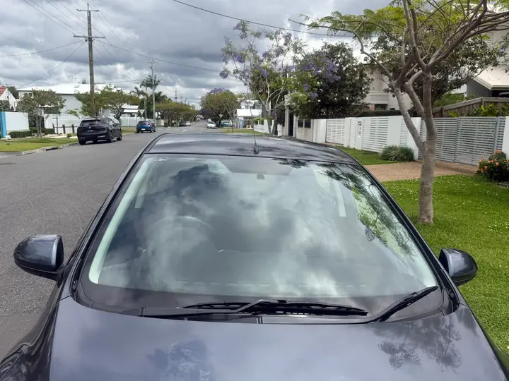 Vehicle photo of the silver 2009 Mazda 2