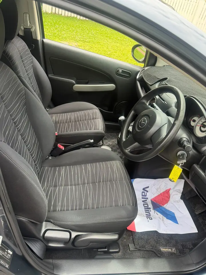 Interior of the silver 2009 Mazda 2