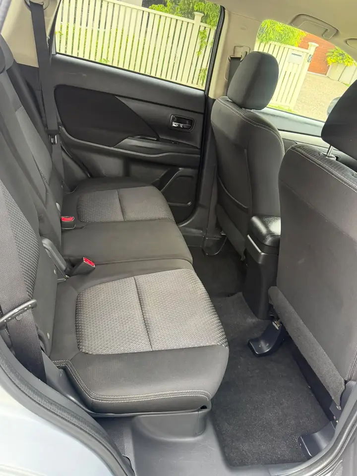 Second-row seats of the silver 2016 Mitsubishi Outlander