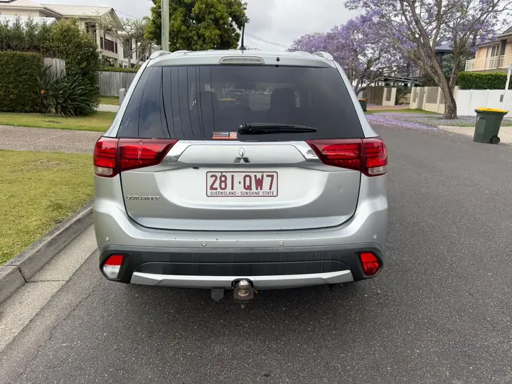 Rear of the silver 2016 Mitsubishi Outlander