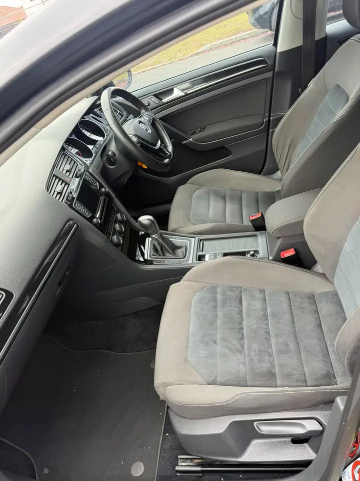 Interior of the black 2014 Volkswagen Golf