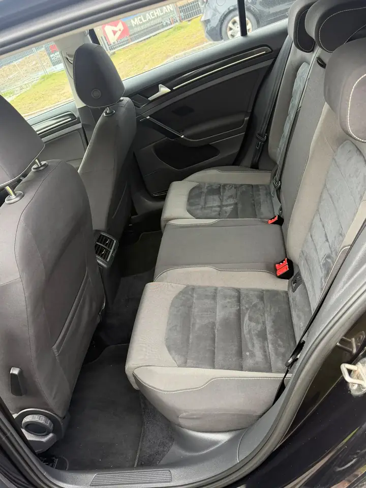 Second-row seats of the black 2014 Volkswagen Golf