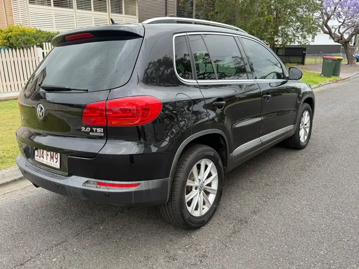 Rear three-quarter view of the black 2013 Volkswagen Tiguan