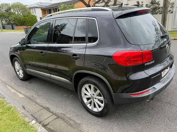 Rear three-quarter view of the black 2013 Volkswagen Tiguan